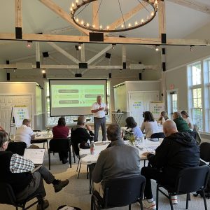 Ron Rix, Brilliant Pathways Program Director, collaborates with participants during a breakout session to explore effective strategies for teaching the Essential Skills.